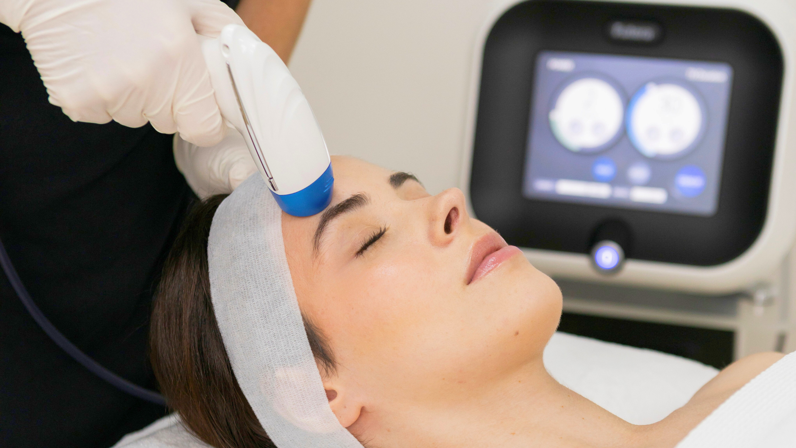 fractional rf machine treatment in use being performed on the forehead